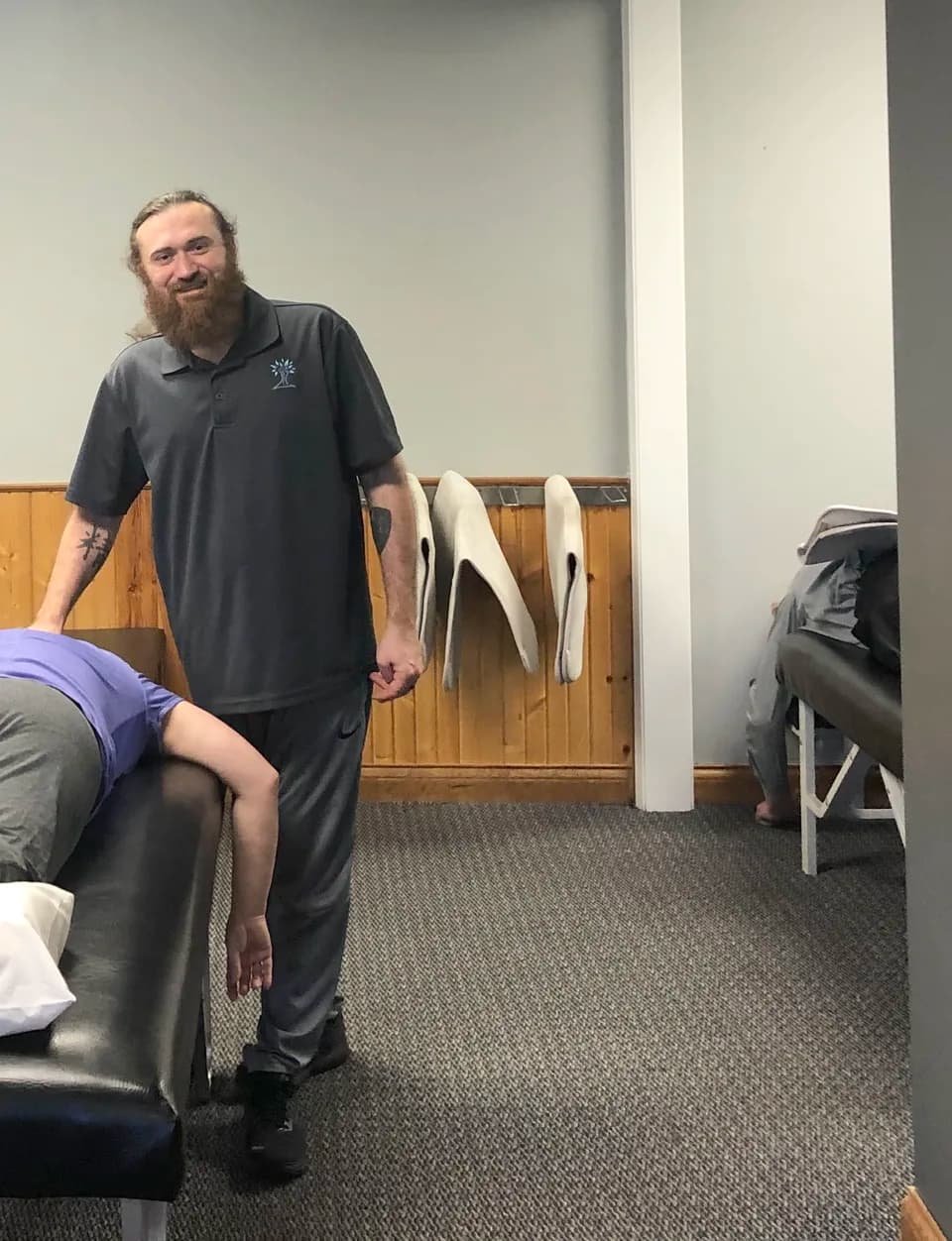 An Eagle Creek Chiropractic team member in the office’s rehab area.